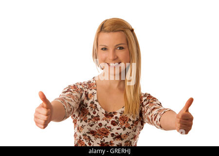 Cute blond woman showing thumbs up as  gesture for success isolated over white Stock Photo