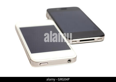 Black and white smart phones isolated on white background Stock Photo