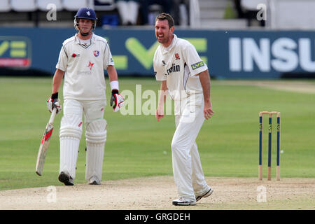 David Masters claims the wicket of Kent batsman Joe Denly - Kent CCC vs Essex CCC - LV County Championship Division Two Cricket - 31/08/11 Stock Photo