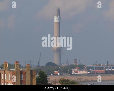 Kent, UK. 7th September, 2016. Isle of Grain chimney demolition sequence. Credit:  James Bell/Alamy Live News Stock Photo
