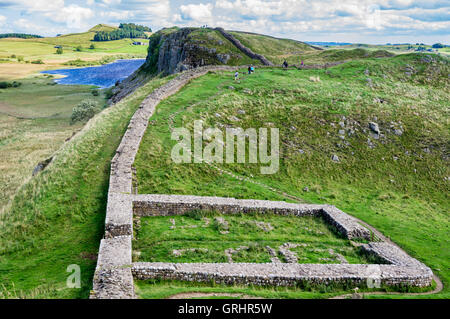 Milecastle 39, Steel Rigg and Crag Lough on Hadrian's Wall near Once Brewed, Cumbria, England Stock Photo