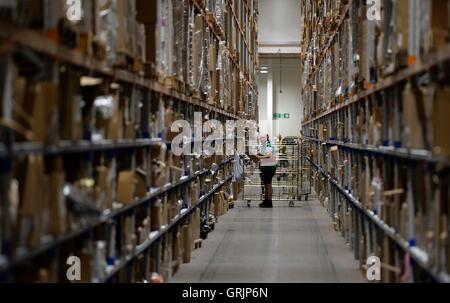 A worker in the Sports Direct warehouse in Shirebrook, Nottinghamshire, as the company held an open day coinciding with its annual general meeting. Stock Photo