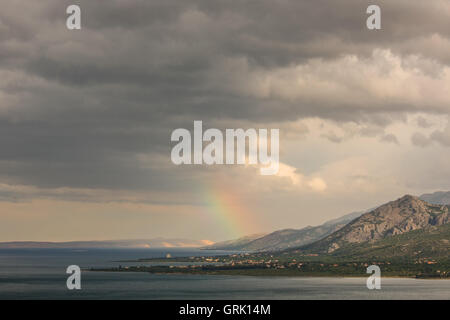 Magic landscape of rainbow above the sea Stock Photo