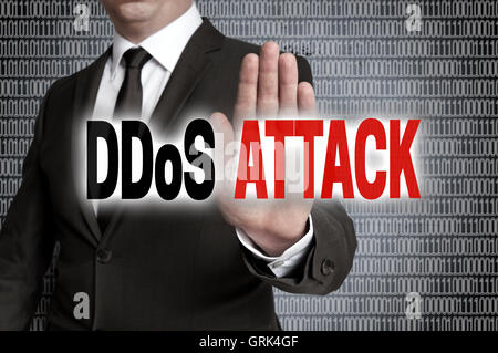 DDoS Attack with matrix is shown by businessman. Stock Photo