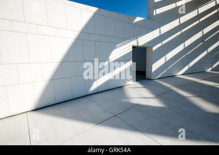 Shadows on a white wall at the Ismaili Cultural Center and Aga Khan Museum of Islamic Art in Toronto, Ontario, Canada. Stock Photo