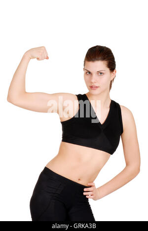 young woman showing off muscles Stock Photo