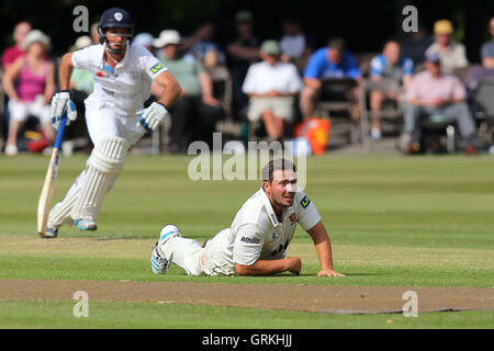 Graham Napier of Essex goes to ground as Derbyshire add to their total - Derbyshire CCC vs Essex CCC - LV County Championship Division Two Cricket at Queen's Park, Chesterfield - 07/07/14 Stock Photo