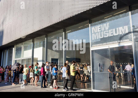 New York City,NY NYC Lower Manhattan,Bowery,New Museum,contemporary art,exterior,entrance,line,queue,visitor,adult,adults,man men male,woman female wo Stock Photo