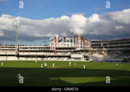 General view of the ground looking towards the pavilion late on Day Three - Surrey CCC vs Essex CCC - LV County Championship Division Two Cricket at the Kia Oval, Kennington, London - 22/04/14 Stock Photo