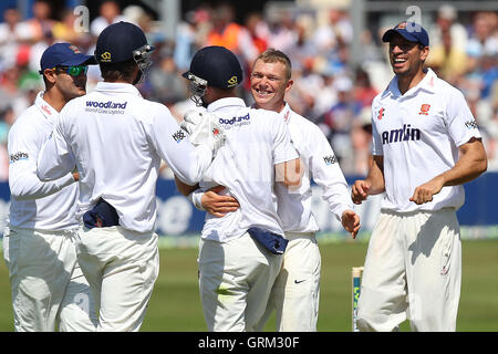 Tom Craddock of Essex (C) celebrates the wicket of Ian Bell - Essex CCC vs England - LV Challenge Match at the Essex County Ground, Chelmsford - 30/06/13 Stock Photo