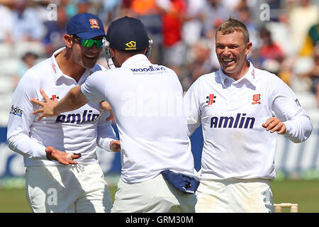 Tom Craddock of Essex (R) celebrates the wicket of Ian Bell - Essex CCC vs England - LV Challenge Match at the Essex County Ground, Chelmsford - 30/06/13 Stock Photo