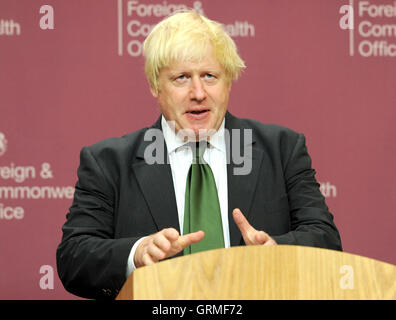 Foreign Secretary Boris Johnson talks to the media during a press briefing with with former Prime Minister Dr Riyad Farid Hijab, the leader of the High Negotiations Committee of the Syrian Opposition (HNC) following a meeting with representatives of the Syrian opposition and foreign ministers from across the world, at the Foreign and Commonwealth Office in central London. Stock Photo