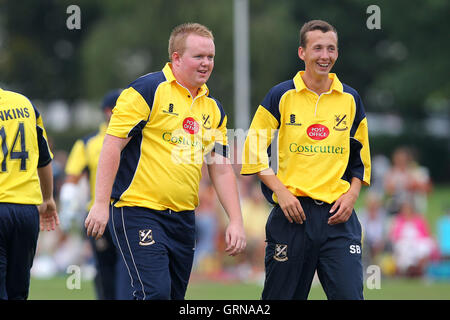 Billy Wright of Upminster (L) celebrates the wicket of Jaik Mickleburgh - Upminster CC vs Essex CCC - David Masters Benefit Match at Upminster Park - 01/09/13 Stock Photo