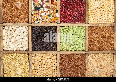 Assorted agricultural cereal products in vintage wooden box Stock Photo