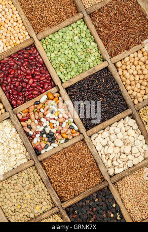 Assorted agricultural cereal products in vintage wooden box. Stock Photo