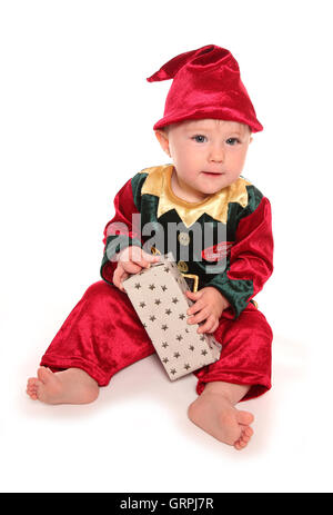 infant dressed in elfs santas little helper fancy dress costume cutout Stock Photo