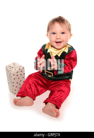 infant dressed in elfs santas little helper fancy dress costume cutout Stock Photo