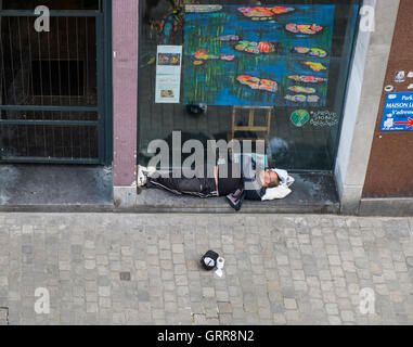 homeless people begging in the street Stock Photo