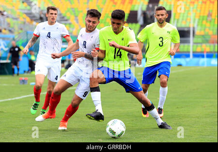 Great Britain's David Porcher (left) and Brazil's Felipe Rafael da Silva Gomes battle for the ball during the Men's 7 a side Football at the Deodoro Stadium during the first day of the 2016 Rio Paralympic Games in Rio de Janeiro, Brazil. Stock Photo