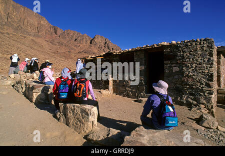 Pilgrims and tourists resting near a refreshment bar along the trail to Mount Sinai, Egypt, Asia Stock Photo