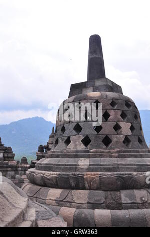 Borobudur, or Barabudur, is a 9th-century Mahayana Buddhist temple in Magelang, Central Java, Indonesia. Stock Photo