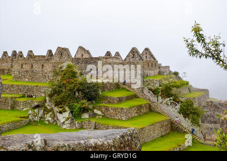 MACHU PICCHU, CUSCO REGION, PERU- JUNE 4, 2013: Details of the residential area of the 15th-century Inca citadel Machu Picchu Stock Photo