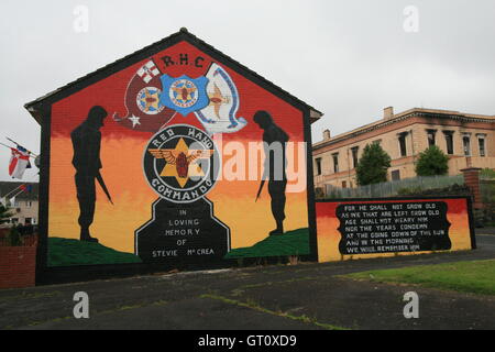 Unionist political mural commemorating Red Hand Commando, Shankill Road, Belfast, Northern Ireland, UK. Stock Photo