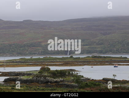 Distant view of Eas Fors waterfall Isle of Mull viewed from Ulva Scotland  September 2016 Stock Photo