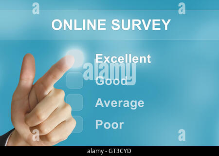 business hand clicking online survey button on screen Stock Photo
