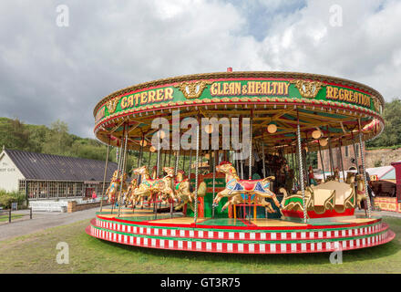 A 1911 set of Gallopers fairground ride at Blists Hill Victorian Town Museum near Telford, Shropshire, England, UK Stock Photo