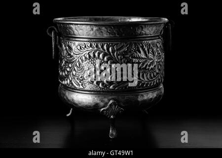 Antique art objects -  medieval cauldron Stock Photo