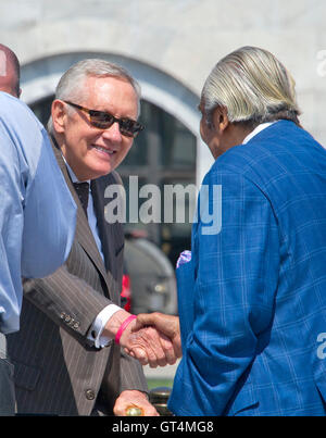 United States Senate Minority Leader Harry Reid (Democrat of Nevada) shakes hands with US Representative Charles Rangel (Democrat of New York) prior to joining other Democratic members of the US House of Representatives and US Senate assemble on the East Steps of the US Capitol to call on Republican leadership in both legislative bodies to schedule votes on funding to combat the Zika Virus, to prohibit people on the federal 'no fly' list from purchasing guns, and to conduct confirmation hearings and schedule a vote on the confirmation of Judge Merrick Garland as Associate Justice of the US Sup Stock Photo