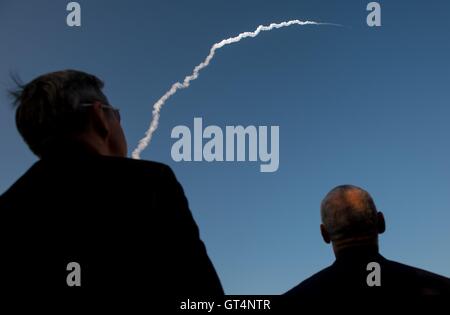 Cape Canaveral, Florida, USA. 8th September, 2016. NASA Administrator Charles Bolden, left, and John F. Kennedy Space Center Director Robert Cabana watch the launch of a United Launch Alliance Atlas V rocket with the NASA OSIRIS-REx spacecraft lifts off from Space Launch Complex 41 September 8, 2016 at Cape Canaveral Air Force Station, Florida. The OSIRIS-REx will be the first U.S. mission to sample an asteroid, retrieve at least two ounces of surface material and return it to Earth for study. Credit:  Planetpix/Alamy Live News Stock Photo
