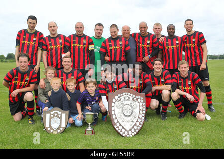 Chapel celebrate the Division Two title - Chapel N1 (red/black) vs Azzurri One - Hackney & Leyton Sunday League Football at South Marsh, Hackney Marshes, London - 16/06/13 Stock Photo