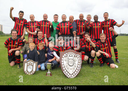 Chapel celebrate the Division Two title - Chapel N1 (red/black) vs Azzurri One - Hackney & Leyton Sunday League Football at South Marsh, Hackney Marshes, London - 16/06/13 Stock Photo