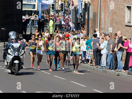 Elite athletes compete in the annual half marathon from Newcastle to South Shields, the Great North Run; which Fahah wins by a s Stock Photo