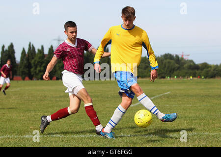 Jay Cubed (yellow/blue) vs Bristow City - Hackney & Leyton Sunday League Football at South Marsh, Hackney Marshes, London - 01/09/13 Stock Photo