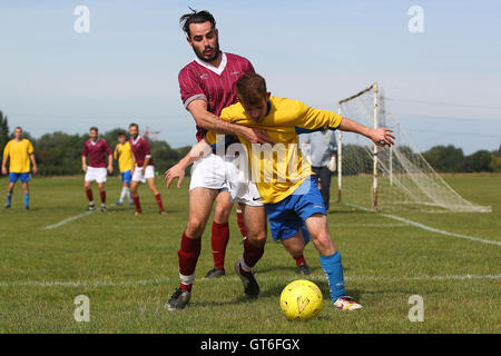 Jay Cubed (yellow/blue) vs Bristow City - Hackney & Leyton Sunday League Football at South Marsh, Hackney Marshes, London - 01/09/13 Stock Photo