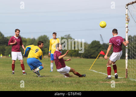 Jay Cubed (yellow/blue) vs Bristow City - Hackney & Leyton Sunday League Football at South Marsh, Hackney Marshes, London - 01/09/13 Stock Photo