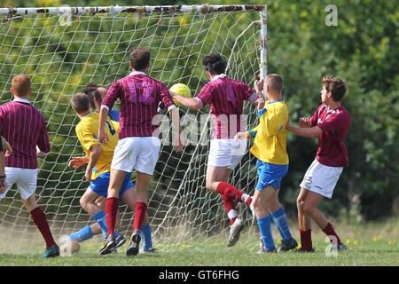 Jay Cubed (yellow/blue) vs Bristow City - Hackney & Leyton Sunday League Football at South Marsh, Hackney Marshes, London - 01/09/13 Stock Photo