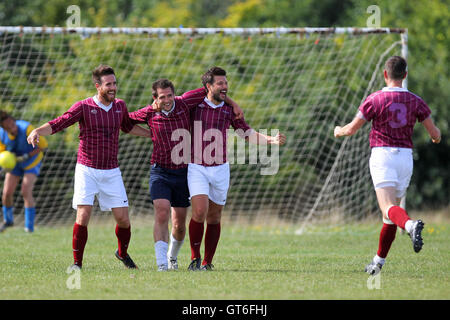 Jay Cubed (yellow/blue) vs Bristow City - Hackney & Leyton Sunday League Football at South Marsh, Hackney Marshes, London - 01/09/13 Stock Photo