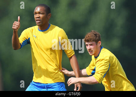 Jay Cubed (yellow/blue) vs Bristow City - Hackney & Leyton Sunday League Football at South Marsh, Hackney Marshes, London - 01/09/13 Stock Photo