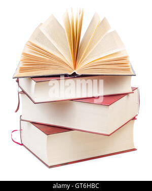 Stack of old thick books isolated on white background Stock Photo