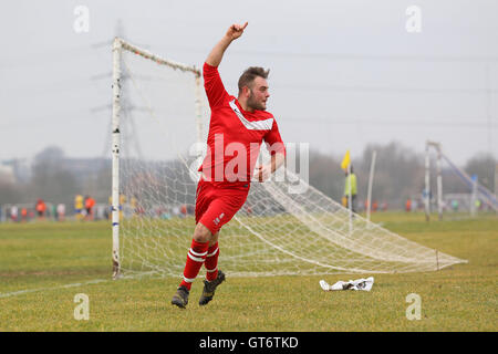 Shakespeare (red) vs MDM United - Hackney & Leyton Sunday League Football at South Marsh, Hackney Marshes, London - 15/02/15 Stock Photo