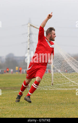 Shakespeare (red) vs MDM United - Hackney & Leyton Sunday League Football at South Marsh, Hackney Marshes, London - 15/02/15 Stock Photo