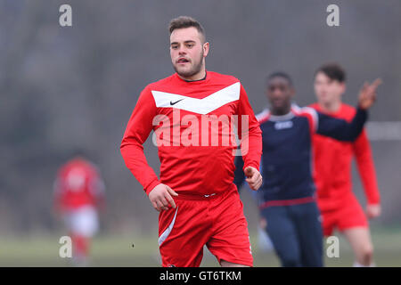 Shakespeare (red) vs MDM United - Hackney & Leyton Sunday League Football at South Marsh, Hackney Marshes, London - 15/02/15 Stock Photo