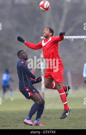 Shakespeare (red) vs MDM United - Hackney & Leyton Sunday League Football at South Marsh, Hackney Marshes, London - 15/02/15 Stock Photo