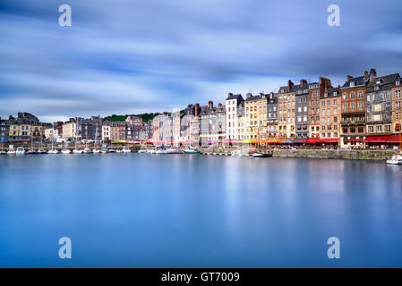 Honfleur famous village harbor skyline and water reflection. Normandy, France, Europe. Long exposure. Stock Photo