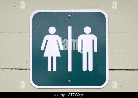 Man and woman symbols on a public washroom wall Stock Photo