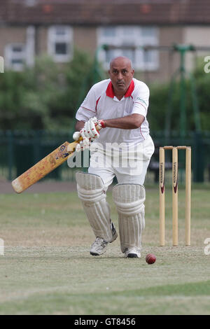 V Patel in bowling action for Goodmayes - Goodmayes & Blythswood CC (fielding) vs Hornchurch Athletic CC 2nd XI - Essex Club Cricket at Goodmayes Park - 14/05/11 Stock Photo